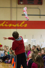 Kids volunteer in the Mousetrap Machine Science Assembly