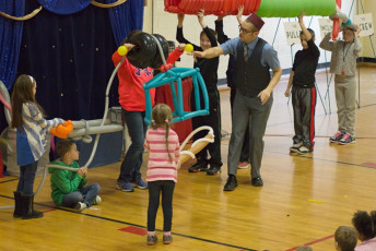 Kids volunteer in the Mousetrap Machine Science Assembly