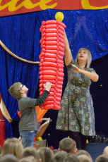 Kids volunteer in the Mousetrap Machine Science Assembly