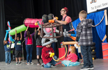 Kids volunteer in the Mousetrap Machine Science Assembly