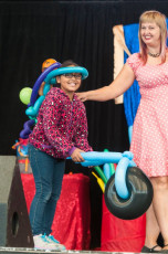 Kids volunteer in the Mousetrap Machine Science Assembly