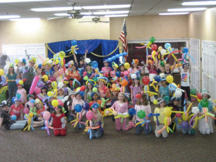 Girl Scouts love to learn how to twist balloons!