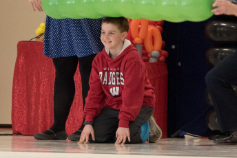 Kids volunteer in the Mousetrap Machine Science Assembly