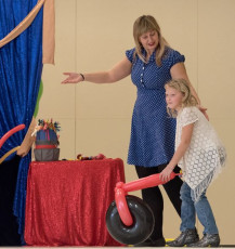 Kids volunteer in the Mousetrap Machine Science Assembly