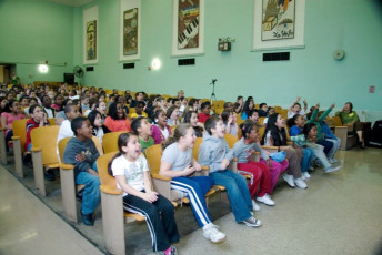 Kids volunteer in the Mousetrap Machine Science Assembly