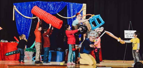 Kids volunteer in the Mousetrap Machine Science Assembly