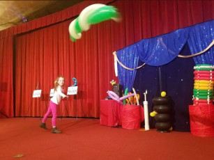 Kids volunteer in the Mousetrap Machine Science Assembly